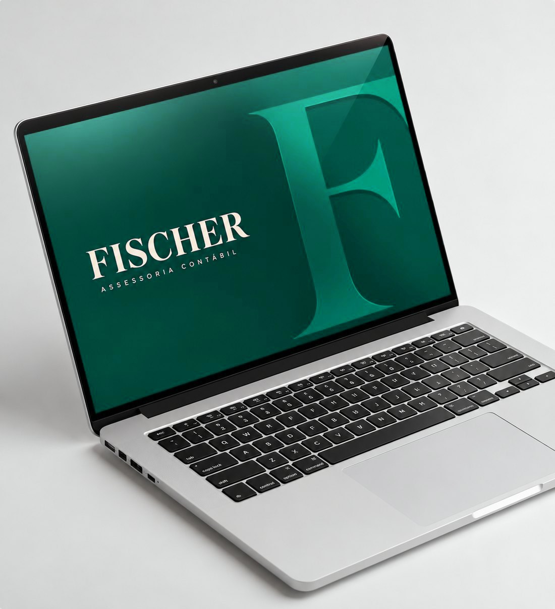 Site da Fischer Assessoria Contábil em um notebook